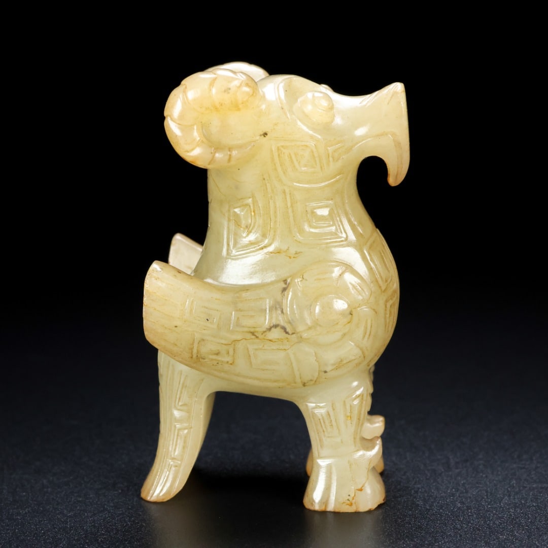 An Archaic Gaogu yu Sheep Ornament: An Archaic Gaogu yu Sheep Ornament,Ancient Time, China, Size:1.6inx1.4inx3in, Weight:133g 高古玉羊摆件,中国远古时期,