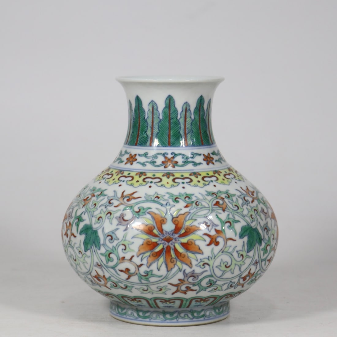 An Exquisite Doucai Lotus Pattern Vase: An Exquisite Doucai Lotus Pattern Vase,Qing Dynasty,China,Qianlong Six-character Mark,Size:6.5inx5.4in 斗彩缠枝莲纹瓶,中国清代,乾