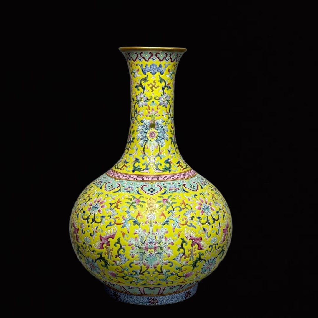 An Exquisite Yellow Ground Famille-Rose Lotus Pattern Vase: An Exquisite Yellow Ground Famille-Rose Lotus Pattern Vase,Qing Dynasty,China,Qianlong Six-Character Mark,Size:12.5inx8.5in 