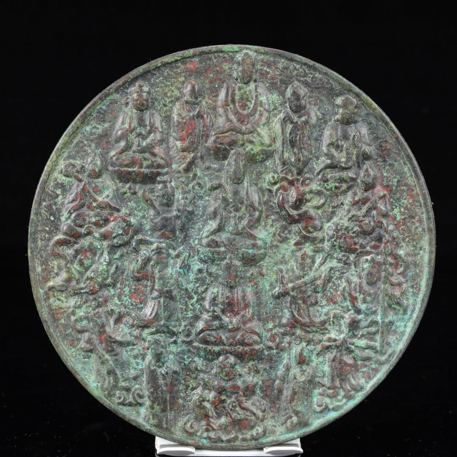 An Archaic Bronze Figure Pattern Round Mirror: An Archaic Bronze Figure Pattern Round Mirror,The Warring States period in China,Size:6.5inx0.2in,Weight:750g 