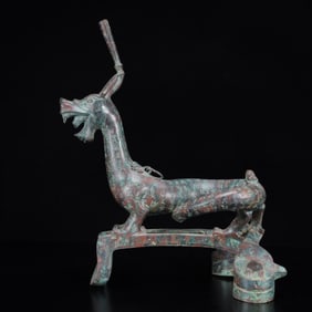 An Archaic Bronze Inscription Dragon Ornament