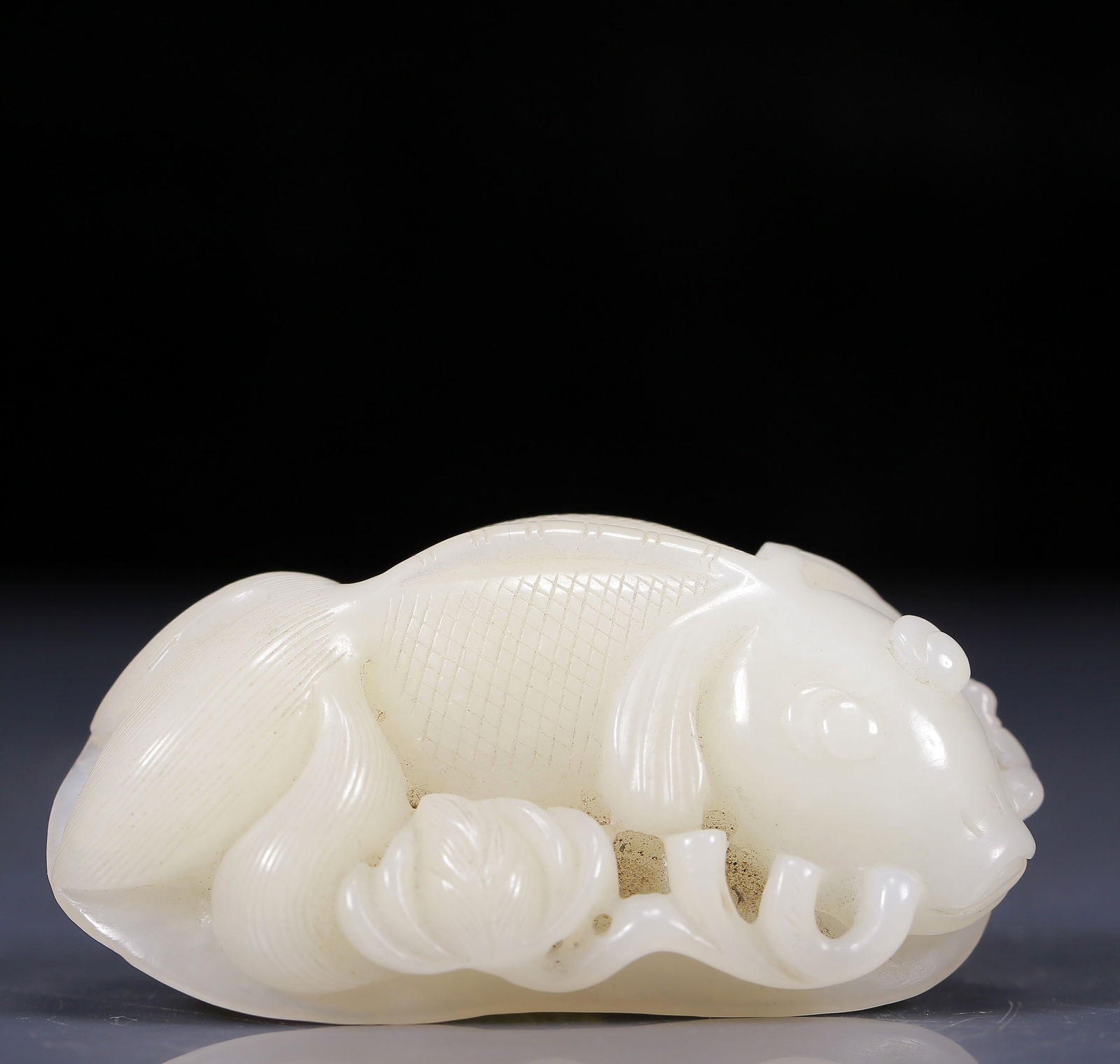 An Exquisite White Jade Fish Pendant (1 of 5)