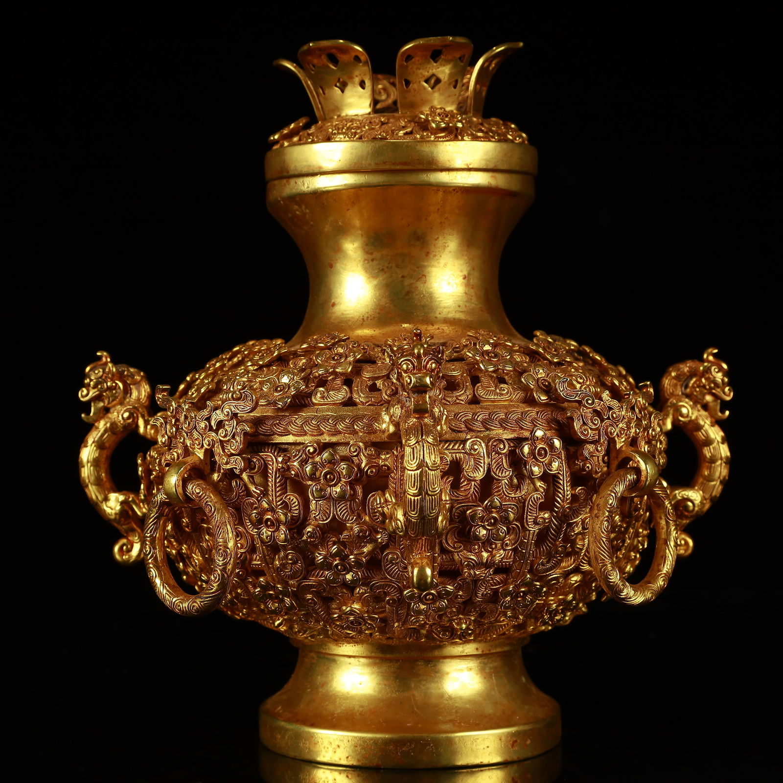 An Exquisite Gilt Bronze Flower Pattern Dragon-Ears Censer: An Exquisite Gilt Bronze Flower Pattern Dragon-Ears Censer,Qing Dynasty, China,Size:7.5inx8.3inx7.5in,Weight:2050g 铜鎏金花卉纹龙耳香炉,