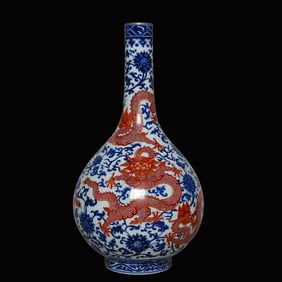An Exquisite Blue and White Iron-Red Lotus and Dragon Pattern Vase