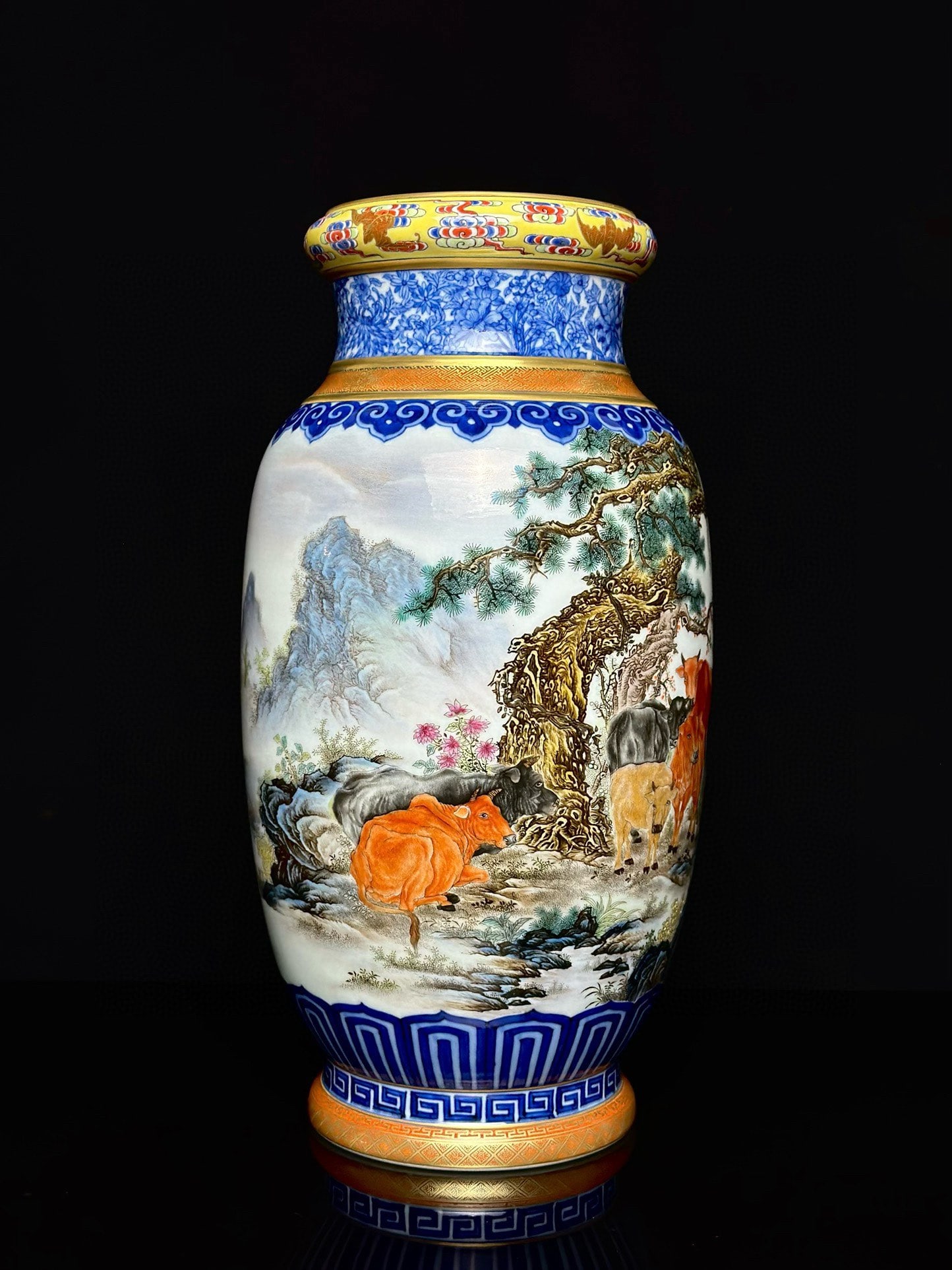 An Exquisite Blue and White Enamel Buffalo Pattern Vase: An Exquisite Blue and White Enamel Buffalo Pattern Vase,Qing Dynasty,China,Qianlong Six-character Mark,Size:12.9inx6.6in 