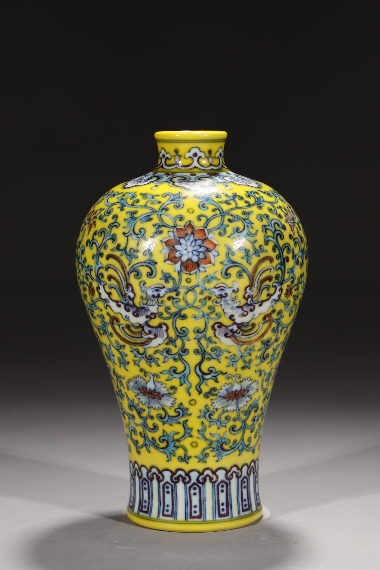 An Exquisite Yellow Ground Doucai Lotus Pattern Vase: An Exquisite Yellow Ground Doucai Lotus Pattern Vase,Qing Dynasty,China,Yongzheng Six-character Mark,Size:9in 