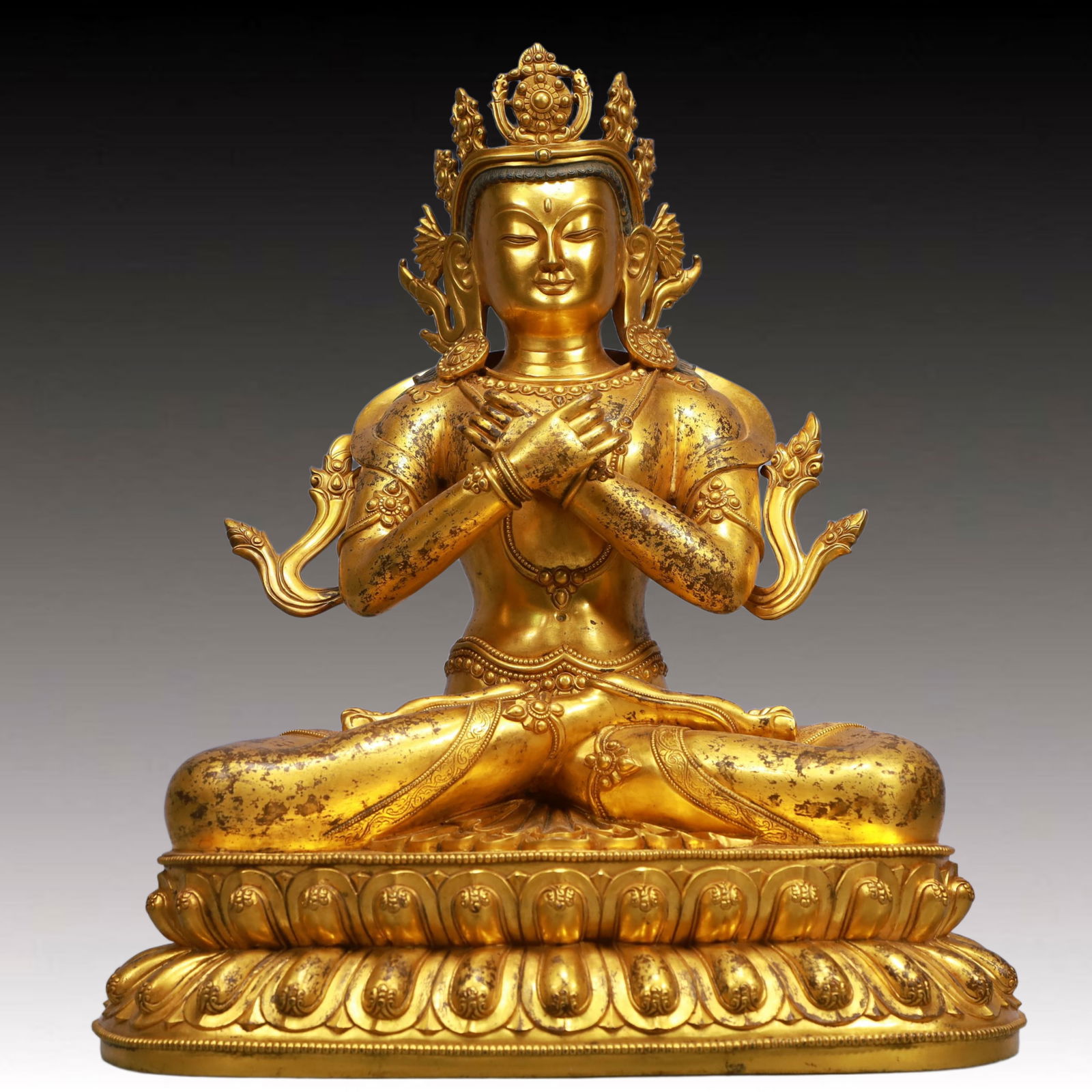 A Solemn Gilt Bronze Statue of Sakyamuni: A Solemn Gilt Bronze Statue of Sakyamuni,Qing Dynasty, China,Qianlong Mark,Size:14.2inx9.8inx18.1in,Weight:14400g 