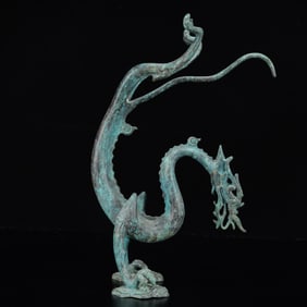 An Archaic Bronze Dragon Ornament