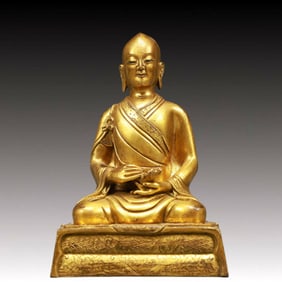 A Solemn Gilt Bronze Statue of Guru