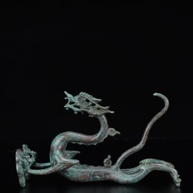 An Archaic Bronze Dragon Ornament