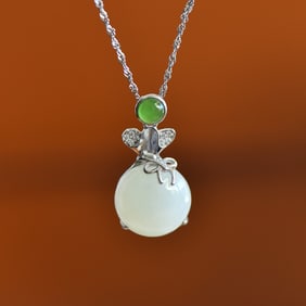 An Exquisite Sterling Silver Inlaid White Jade Pendant