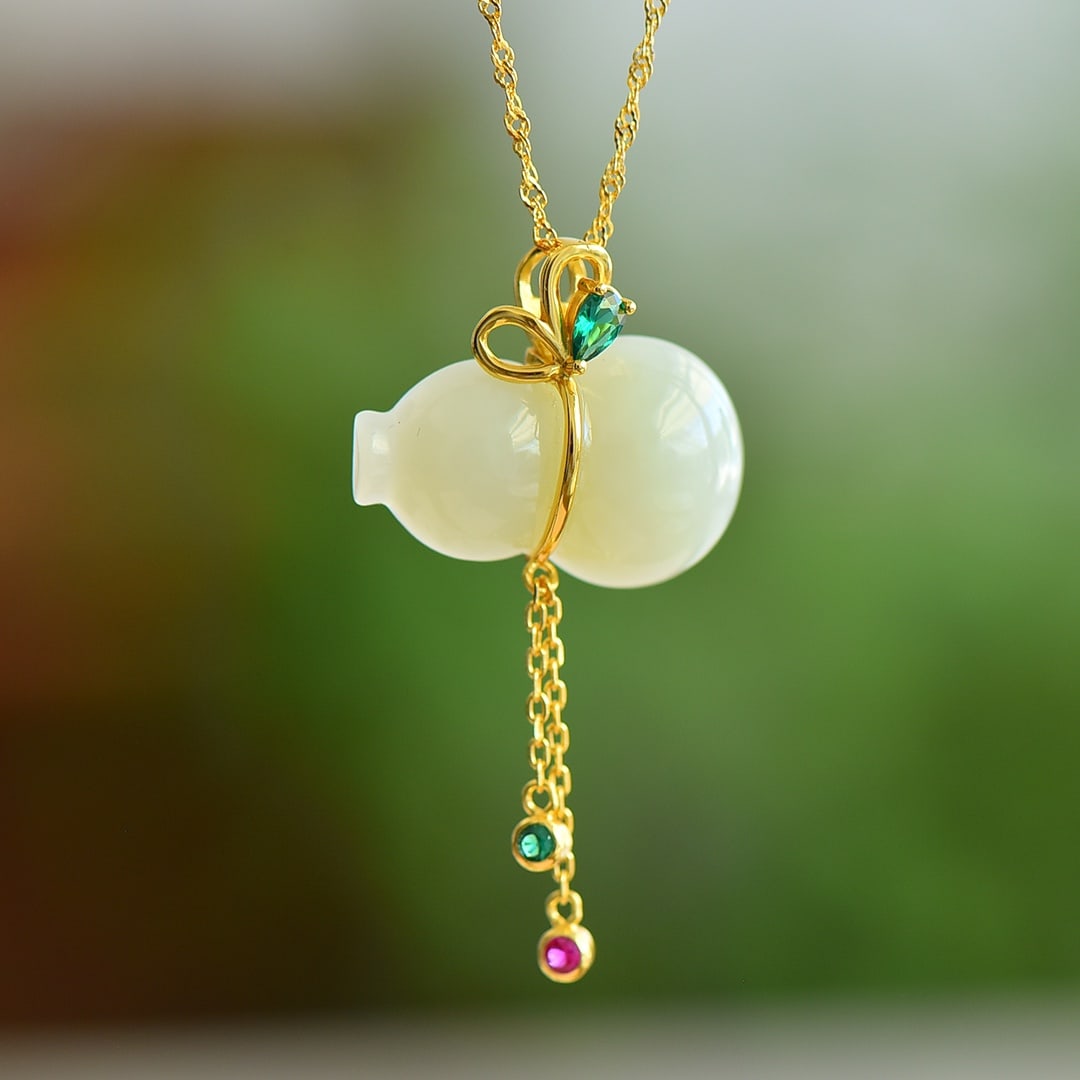 An Exquisite Sterling Silver-Gold Plated Inlaid White Jade Pendant: An Exquisite Sterling Silver-Gold Plated Inlaid White Jade Pendant, 纯银镀金镶白玉吊坠