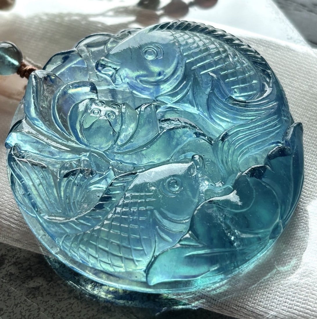 An Exquisite Aquamarine Fish Necklace: An Exquisite Aquamarine Fish Necklace,Size:2inx0.4in,Weight:43.5g 海蓝宝鱼吊坠
