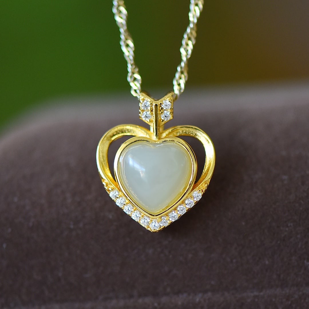 An Exquisite Sterling Silver-Gold Plated Inlaid White Jade Pendant: An Exquisite Sterling Silver-Gold Plated Inlaid White Jade Pendant,Size:0.3inx0.3in 纯银镀金镶白玉吊坠