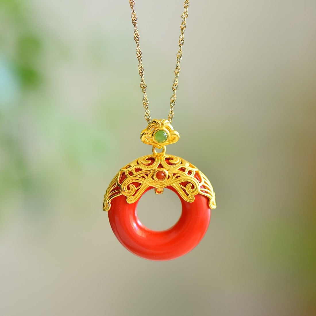 An Exquisite Sterling Silver-Gold Plated Inlaid Cinnabar Pendant: An Exquisite Sterling Silver-Gold Plated Inlaid Cinnabar Pendant,Size:1inx1in 寓意:平平安安 纯银镀金镶朱砂吊坠