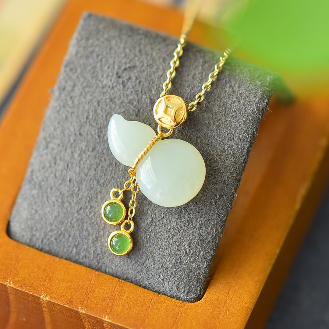 A Pair of Exquisite Sterling Silver-Gold Plated Inlaid White Jade Necklace: A Pair of Exquisite Sterling Silver-Gold Plated Inlaid White Jade Necklace,Size:0.8inx1.2in 纯银镀金镶白玉项链