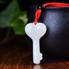 An Exquisite White Jade Key Pendant
