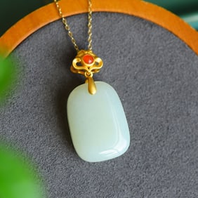 An Exquisite Sterling Silver-Gold Plated Inlaid White Jade Pendant