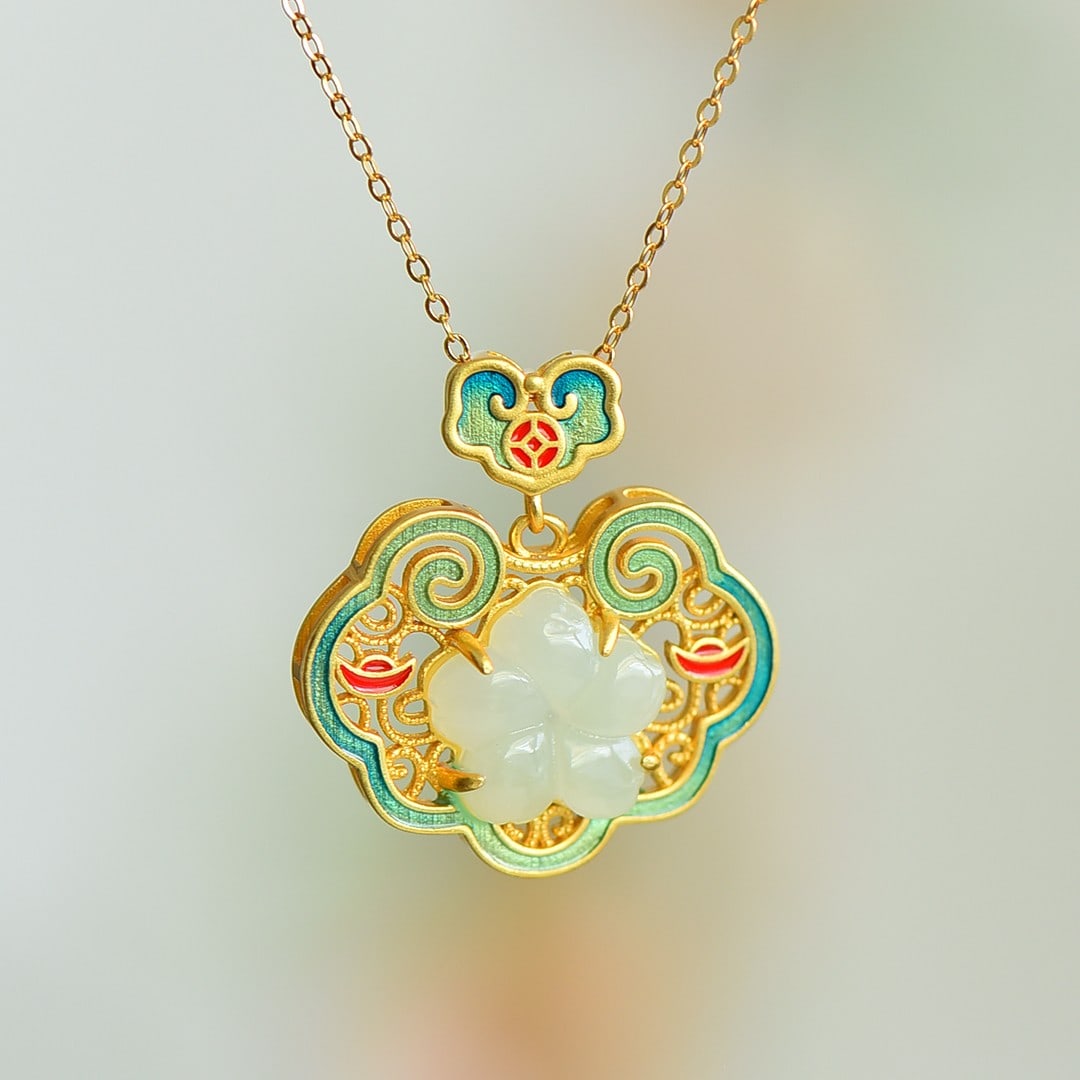 An Exquisite Sterling Silver-Gold Plated Inlaid White Jade Pendant: An Exquisite Sterling Silver-Gold Plated Inlaid White Jade Pendant 纯银镀金镶白玉吊坠