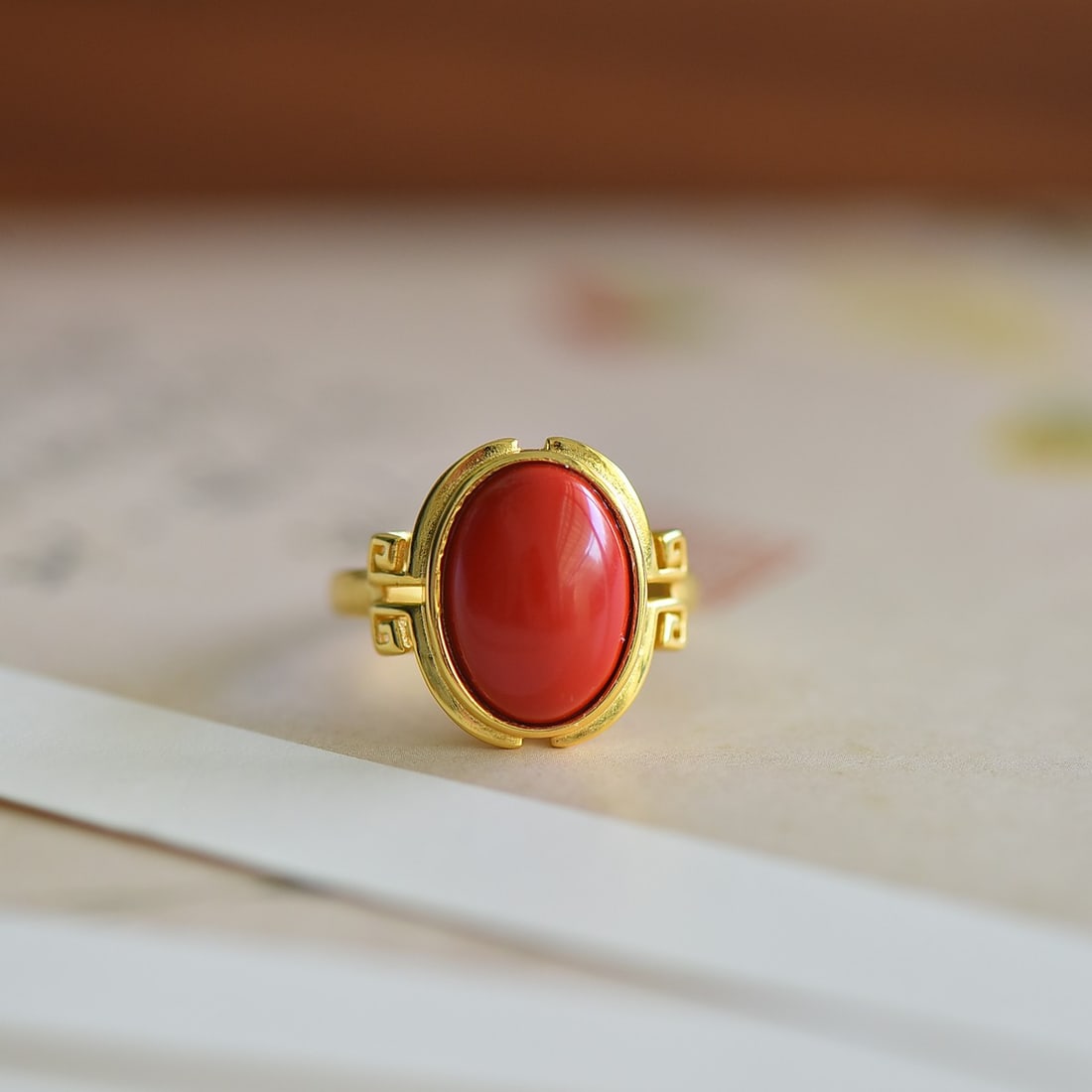 An Exquisite Sterling Silver-Gold Plated Inlaid Cinnabar Ring: An Exquisite Sterling Silver-Gold Plated Inlaid Cinnabar Ring,Size:0.4inx0.6in 纯银镀金镶朱砂戒指