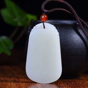 An Exquisite White Jade Pendant