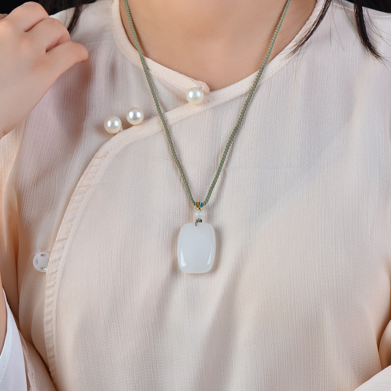 An Exquisite White Jade Pendant: An Exquisite White Jade Pendant,Size:1inx1.4in 白玉挂件