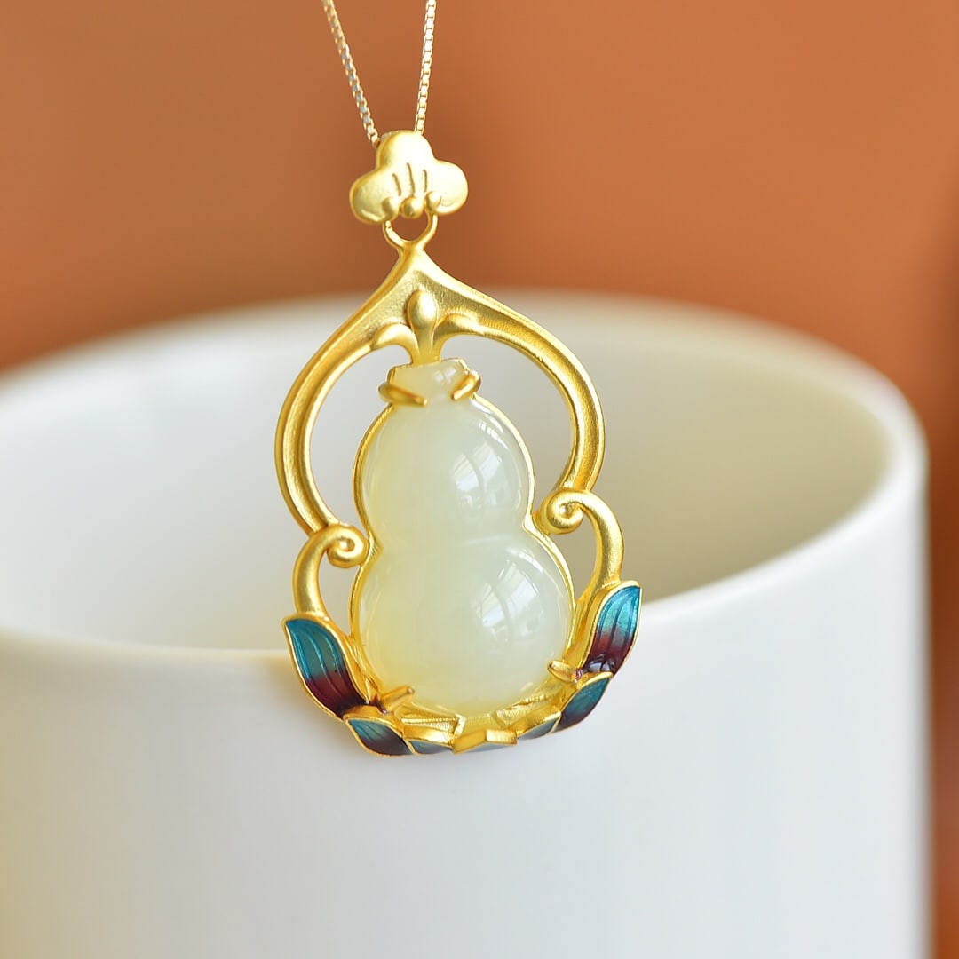 An Exquisite Sterling Silver-Gold Plated Inlaid White Jade Gourd-Shaped Pendant: Sterling Silver-Gold Plated Inlaid White Jade Gourd-Shaped Pendant , Size :0.6inx0.9in 
