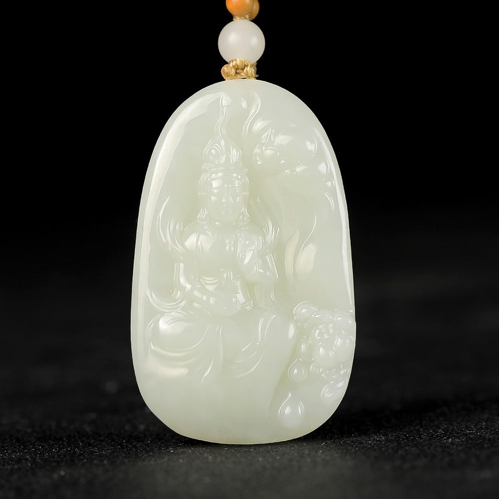 An Exquisite White Jade Statue of Avalokitesvara Pendant: An Exquisite White Jade Statue of Avalokitesvara Pendant,Size:1.9inx1.1inx0.3in 白玉观音像挂件