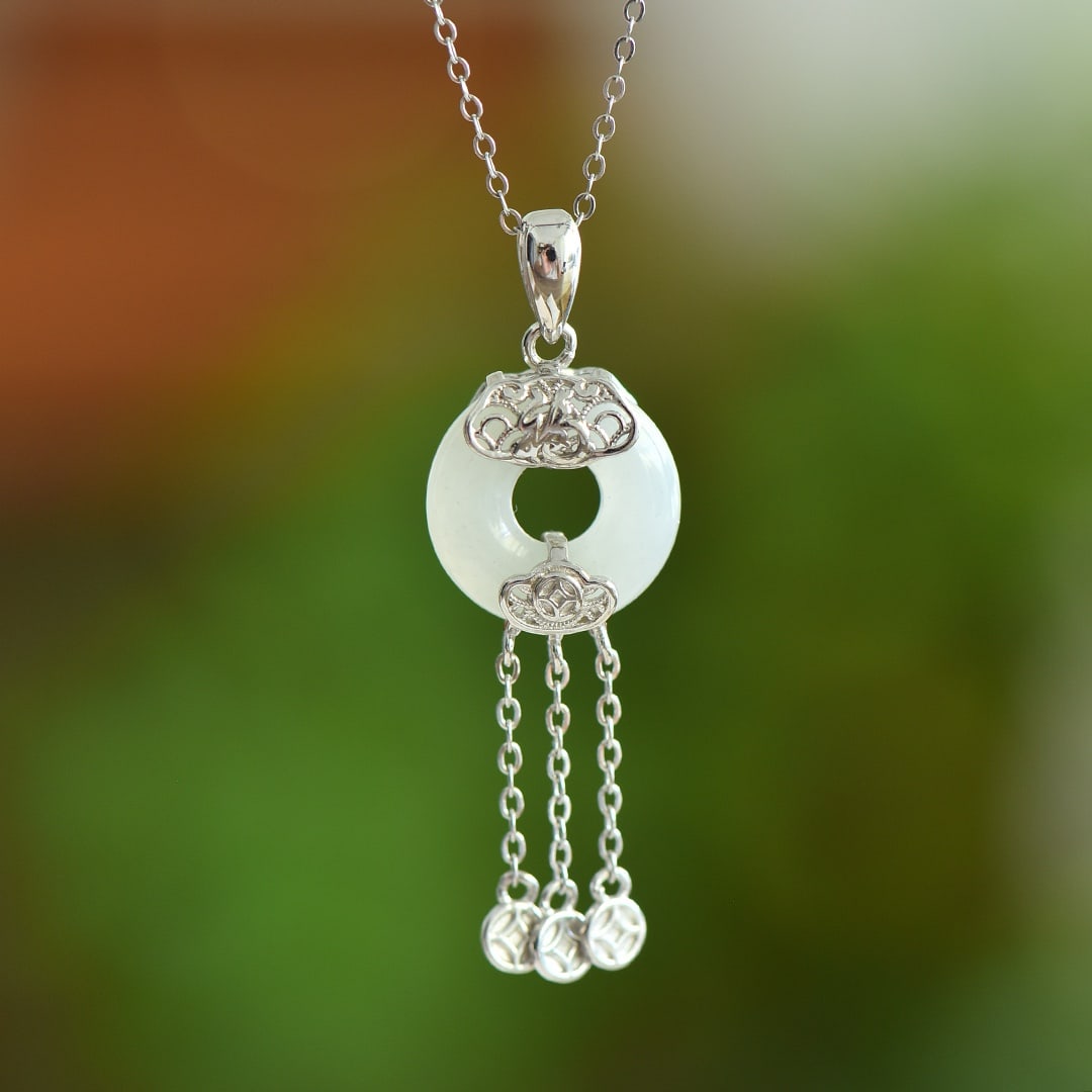 An Exquisite Sterling Silver Inlaid White Jade Pendant: An Exquisite Sterling Silver Inlaid White Jade Pendant, 纯银镶白玉吊坠