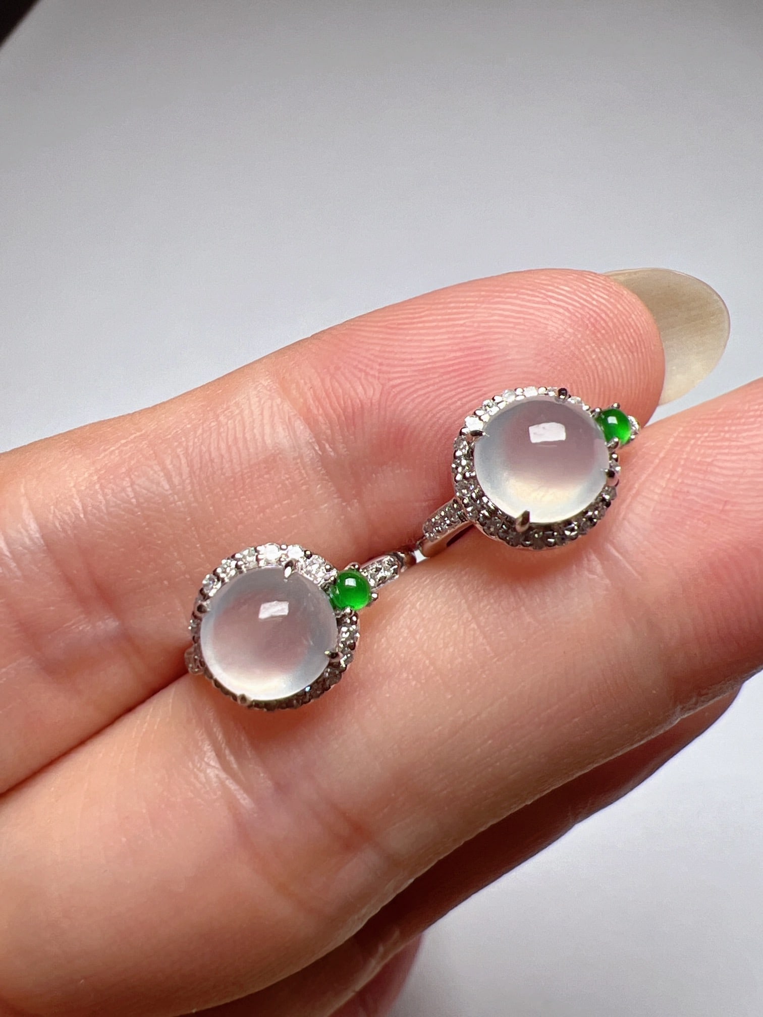 A Pair of Exquisite 18k Gold Diamond Inlaid Jadeite Earrings: A Pair of Exquisite 18k Gold Diamond Inlaid Jadeite Earrings,Size(Loose Stone):0.3inx0.3inx0.2in 一对18k金钻镶嵌翡翠耳环