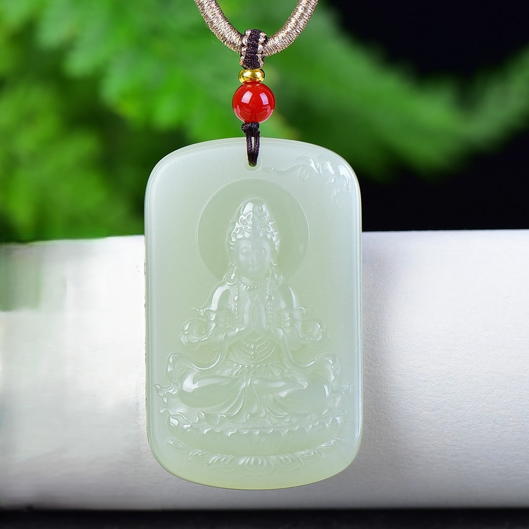 An Exquisite White Jade Statue of Avalokitesvara Pendant: An Exquisite White Jade Statue of Avalokitesvara Pendant,Size:1.3inx2in 白玉观音像挂件