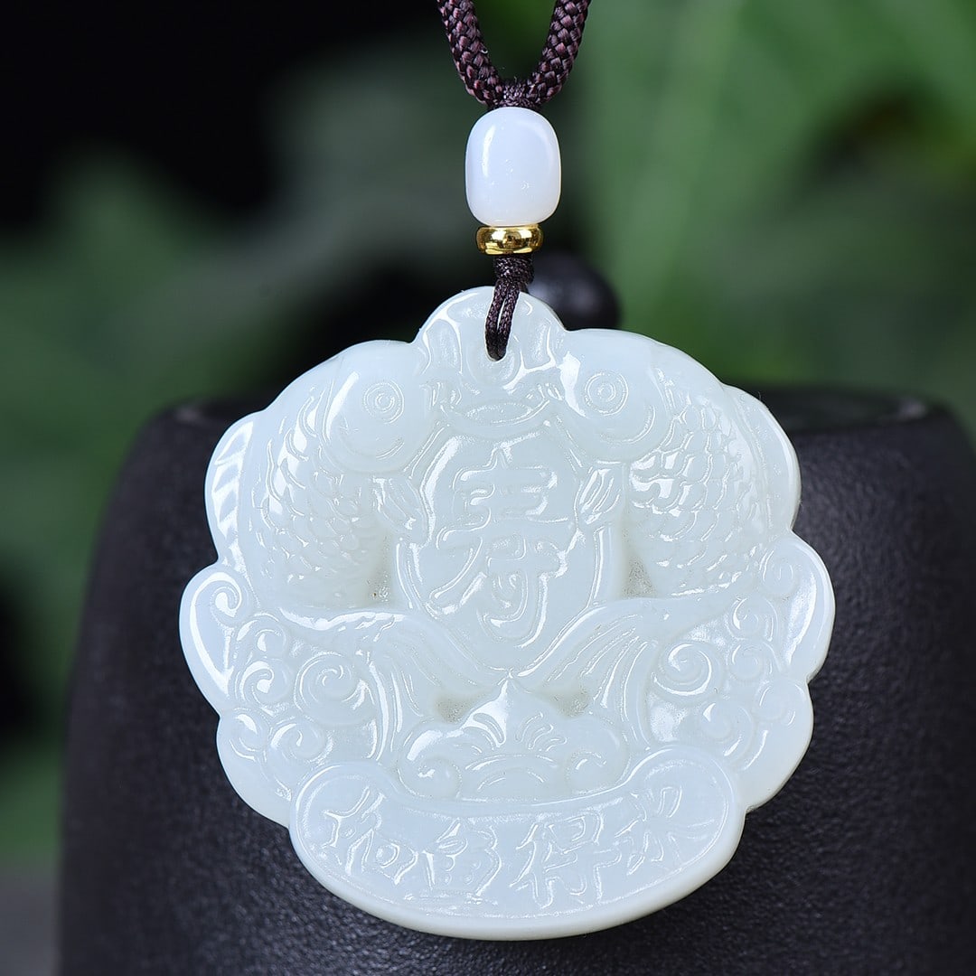 An Exquisite White Jade Fish Pattern Pendant: An Exquisite White Jade Fish Pattern Pendant,Size:1.9inx1.9in 白玉鱼纹挂件