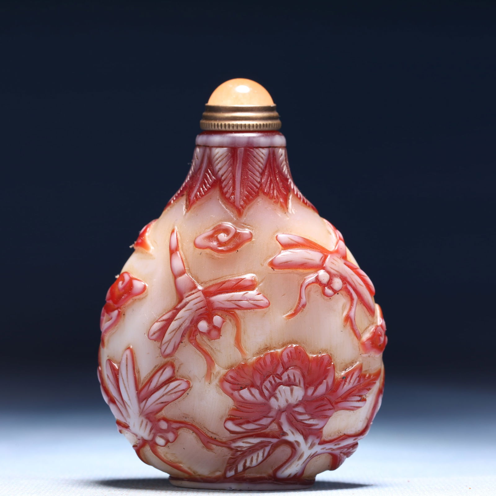 An Exquisite Glass Flower and Butterfly Pattern Snuff Bottle: An Exquisite Glass Flower and Butterfly Pattern Snuff Bottle,Qing Dynasty,China,Qianlong Four-character Mark,Size:2.2inx1.2inx3.1in,Weight:74g 琉璃花卉蝴蝶纹&