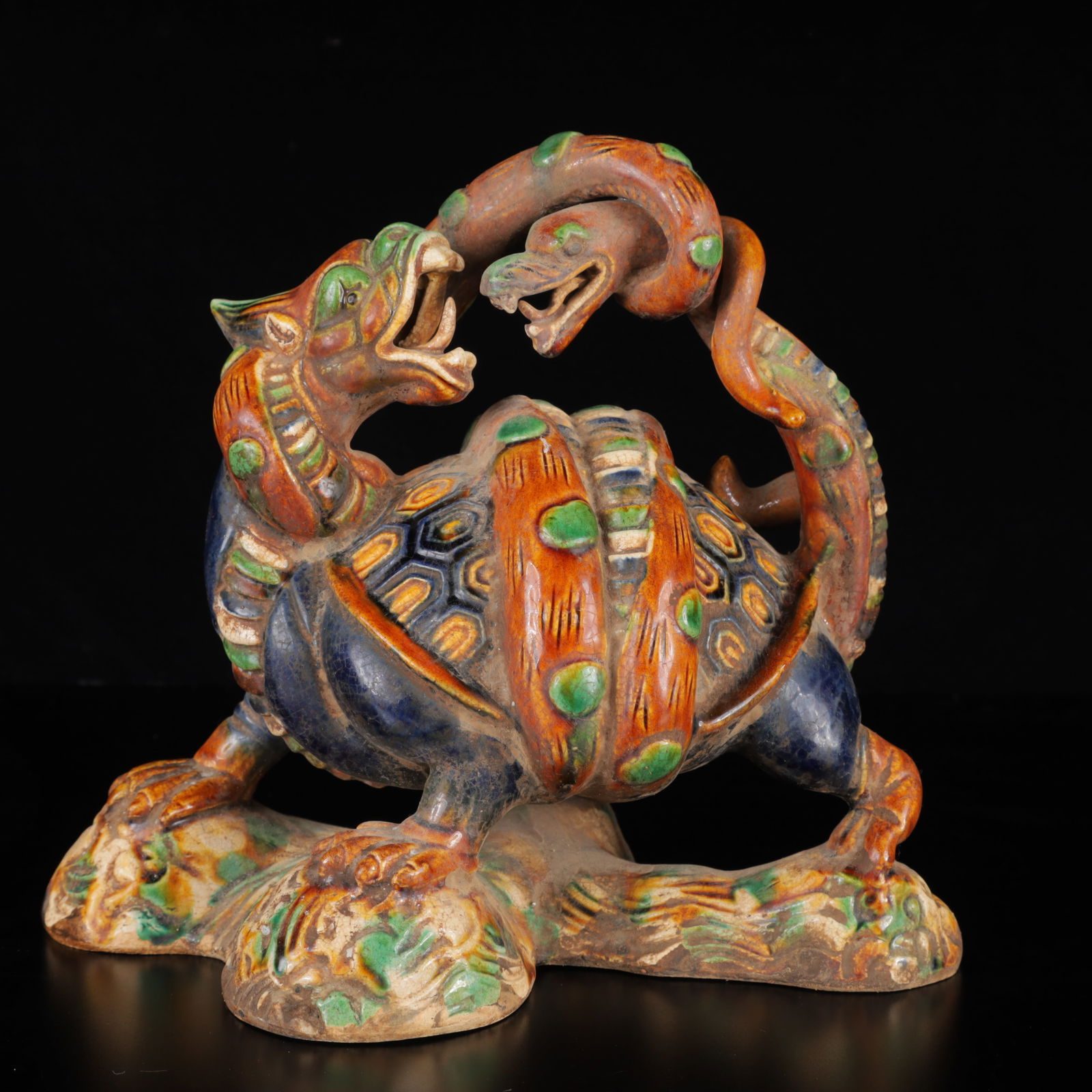 An Exquisite Tang Tri-Color Glazed Pottery Auspicious Beast Ornament: An Exquisite Tang Tri-Color Glazed Pottery Auspicious Beast Ornament,Tang Dynasty,China,Size:7.9inx9.4inx5.9in,Weight:1300g 