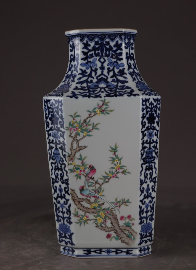 An Exquisite Blue and White Famille-Rose Flower and Bird Pattern Vase: An Exquisite Blue and White Famille-Rose Flower and Bird Pattern Vase,Qing Dynasty,China,Qianlong Six-character Mark,Size:12.8inx6.5in 
