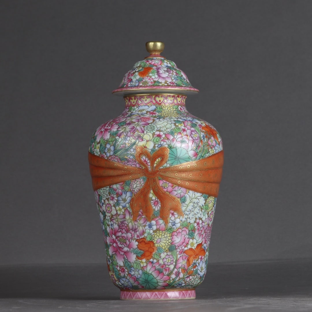 An Exquisite Enamel Gold Ground Flower Pattern Jar with Cover: An Exquisite Enamel Gold Ground Flower Pattern Jar with Cover,Qing Dynasty,China,Qianlong Six-character Mark,Size:7.7inx4.3in 