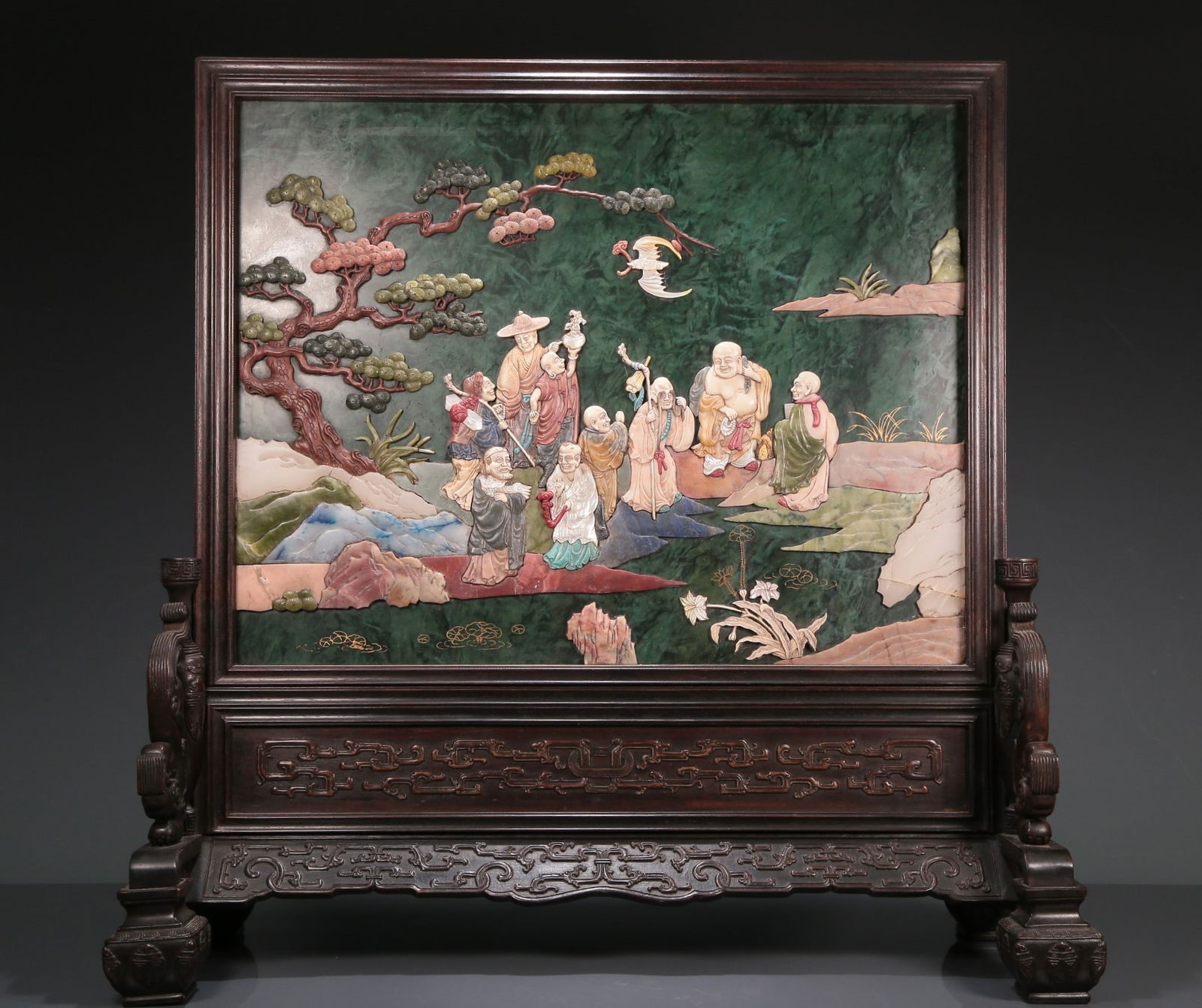 A Wonderful Zitanwood Jasper Gem-Inlaid Gilded 'Arhat' Table Screen: A Wonderful Zitanwood Jasper Gem-Inlaid Gilded 'Arhat' Table Screen. Inlaid in polychrome with robed figures and lush pines. Chinese Qing Dynasty. Size:22.2inx8.7inx22in