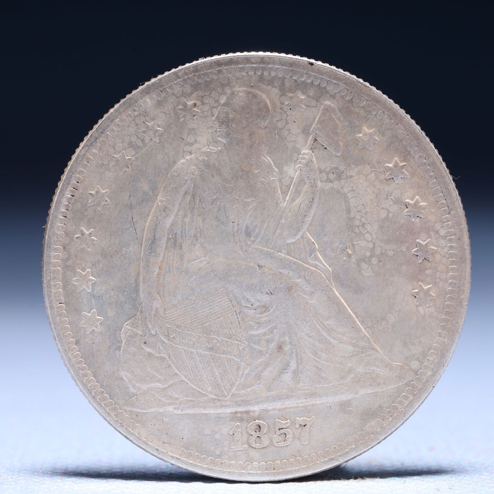USA One Dollar 1857 Coin: American coin. IN GOD WE TRUST / LIBERTY / 1857 / UNITED STATES OF AMERICA / ONE DOL. Weight:26.9g.