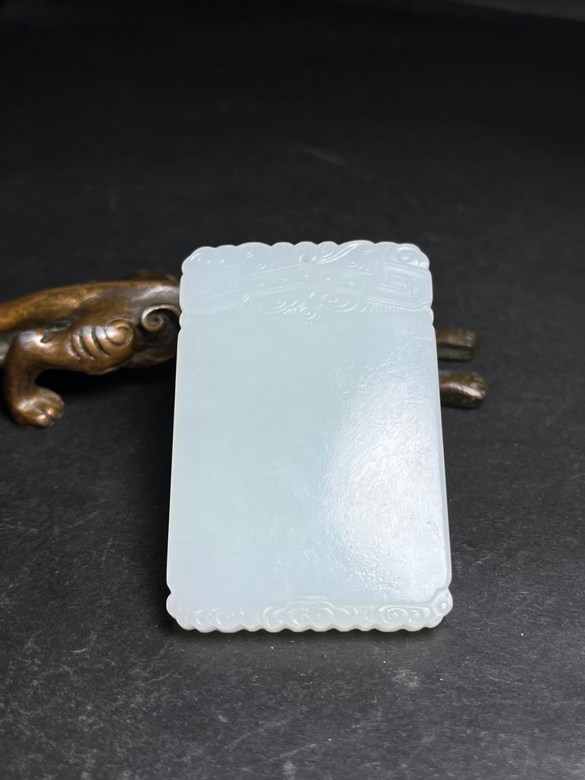 An Exquisite White Jade Pendant: An Exquisite White Jade Pendant,Qing Dynasty,China,Size:1.6inx0.3inx2.4in,Weight:44g 白玉挂件,中国清代