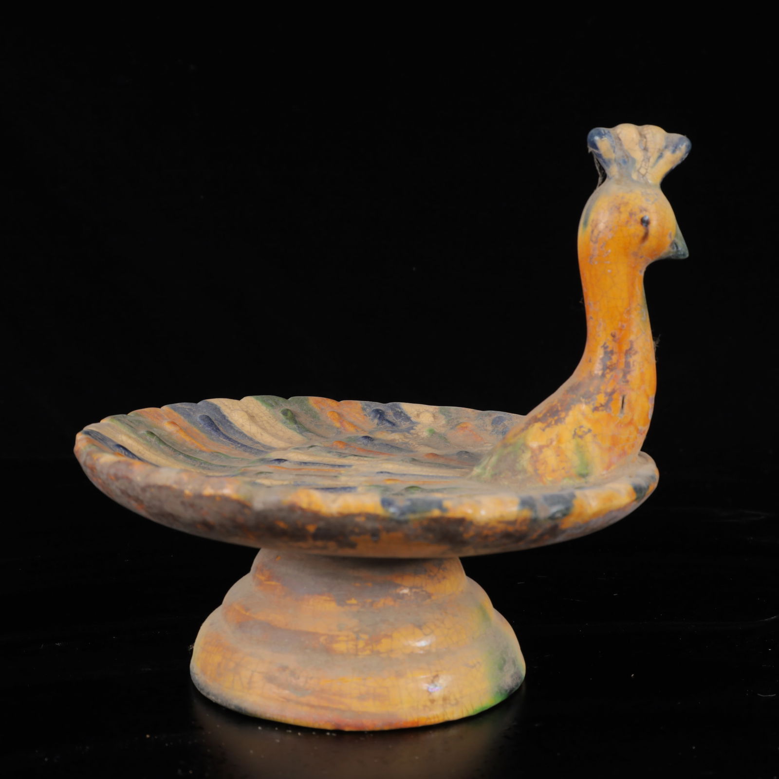 An Exquisite Tang Tri-Color Glazed Pottery Peacock Plate: An Exquisite Tang Tri-Color Glazed Pottery Peacock Plate,Tang Dynasty,China,Size:6.7inx7.1inx7.1in,Weight:800g 唐三彩孔雀盘,中国唐代