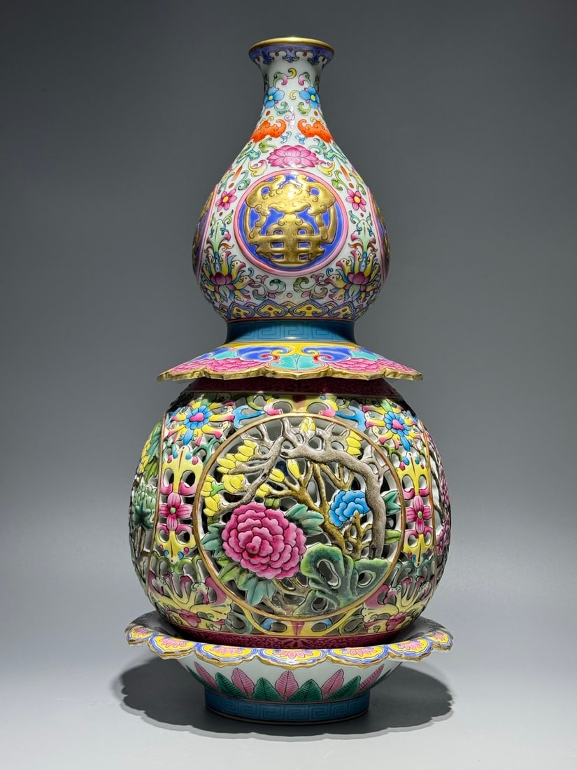 A Rare Enamel Flower Pattern Gourd-Shaped Vase: A Rare Enamel Flower Pattern Gourd-Shaped Vase,Qing Dynasty,China,Qianlong Six-character Mark,Size:15.1inx7.5in 珐琅彩花卉纹葫芦瓶,中国