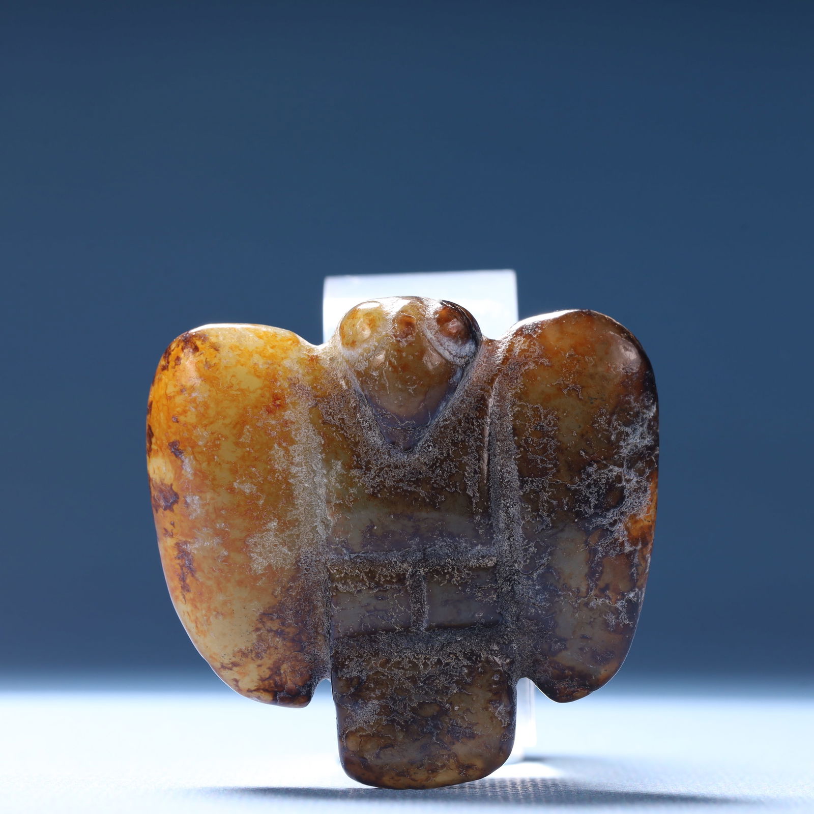 An Archaic Hongshan Culture Yellow Jade Bird Ornament: An Archaic Hongshan Culture Yellow Jade Bird Ornament,Ancient Time,China,Size:1.9inx2inx0.5in,Weight:38.4g 