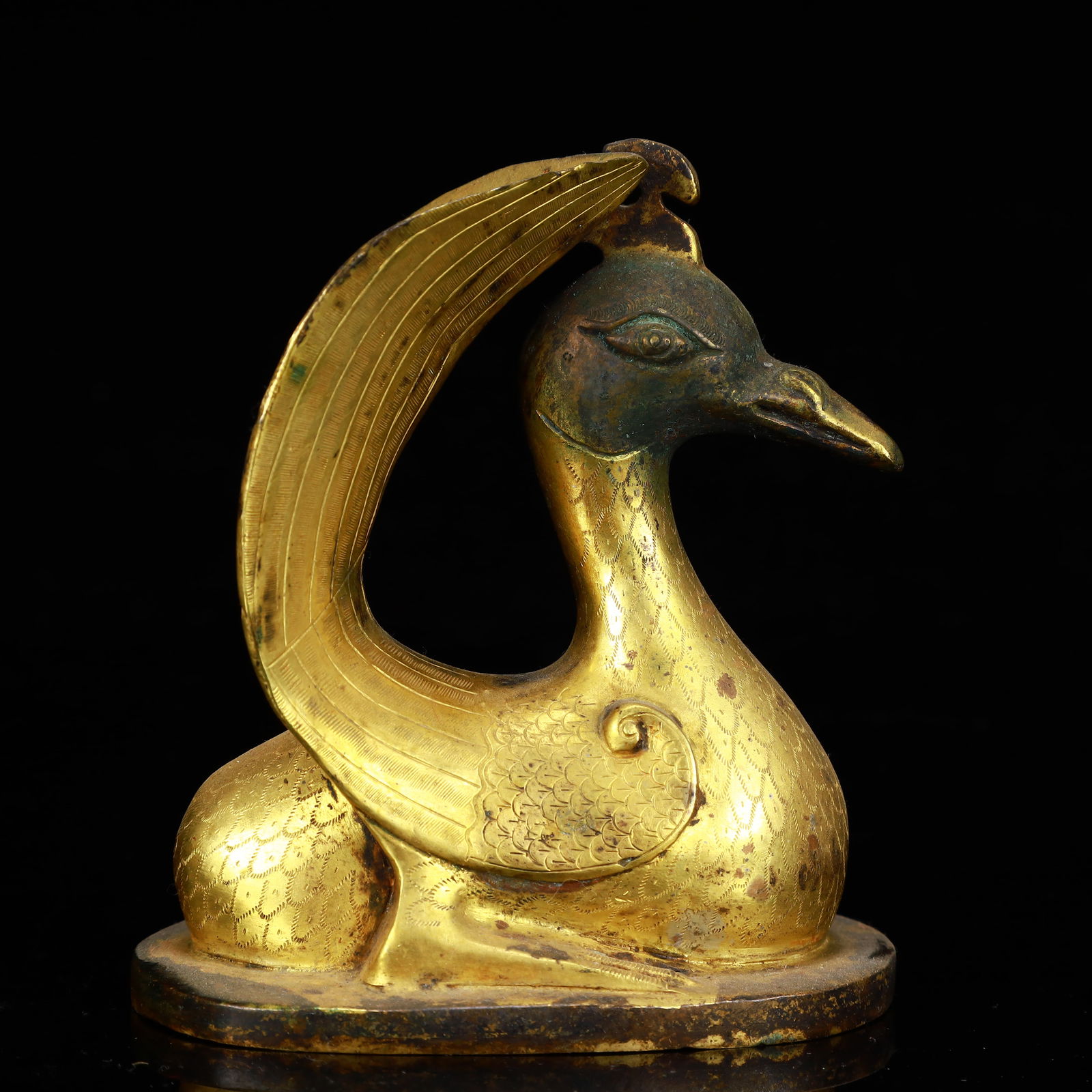 A Rare Gilt Bronze Duck Ornament: A Rare Gilt Bronze Duck Ornament,The Warring States period in China,Size:4.1inx2.8inx4.5in,Weight:650g 