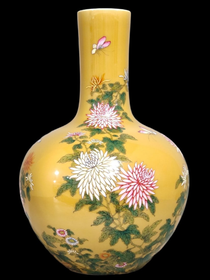 A Rare Yellow Glazed Enamel Flower and Butterfly Pattern Vase: A Rare Yellow Glazed Enamel Flower and Butterfly Pattern Vase,Qing Dynasty,China,Yongzheng Six-character Mark,Size:15.4inx9.8in 黄釉珐琅彩花卉蝴蝶