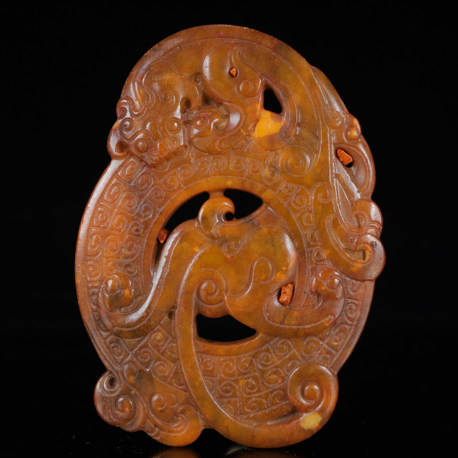 A Rare Gaogu yu Auspicious Beast Pattern Pendant: A Rare Gaogu yu Auspicious Beast Pattern Pendant,Ancient Time,China,Size:3.7inx0.6inx5.1in,Weight:214g 高古玉瑞兽纹挂件,中国远古