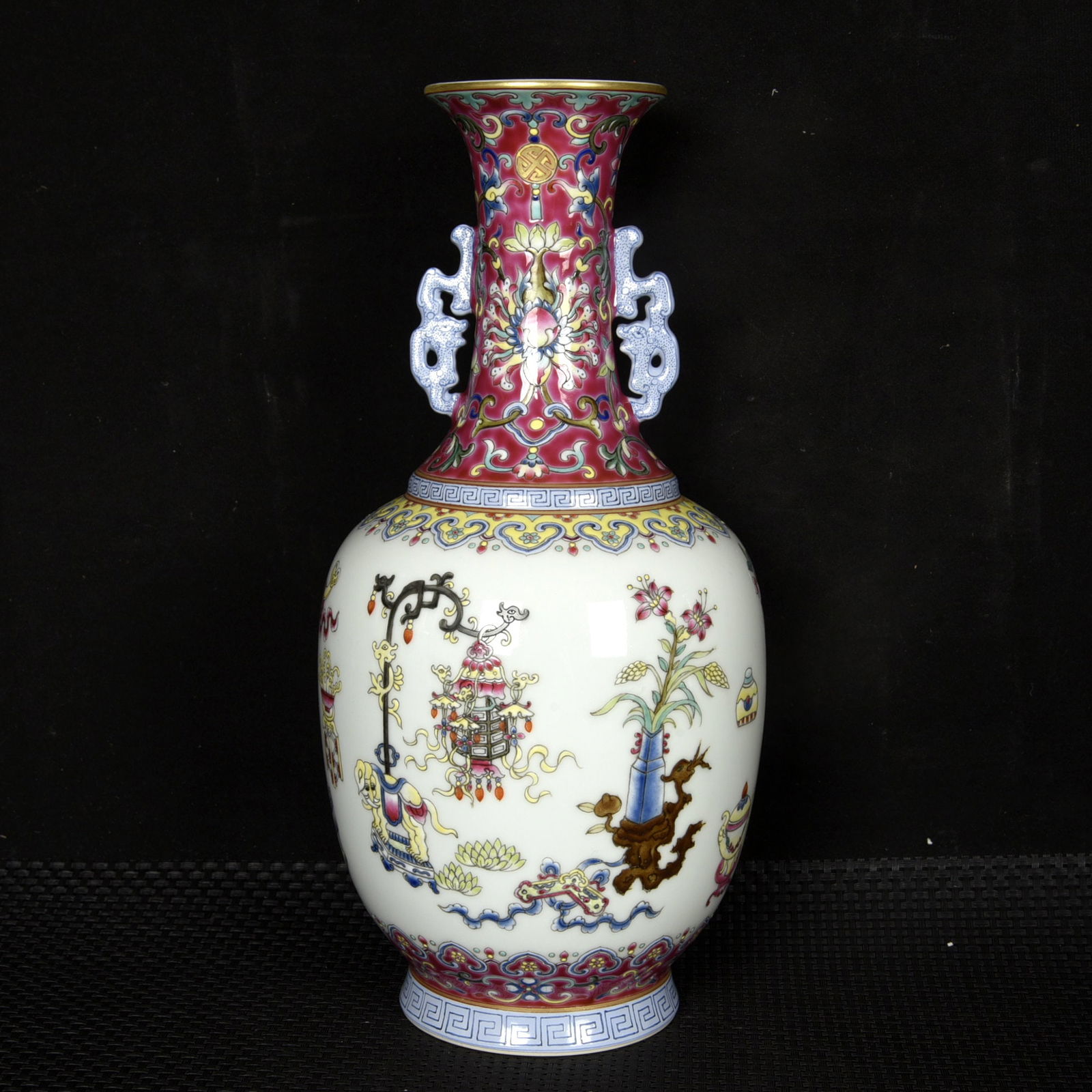 A Rare Enamel Painted Gold Flower Pattern Double-Ears Vase: A Rare Enamel Painted Gold Flower Pattern Double-Ears Vase,Qing Dynasty,China,Qianlong Six-character Mark,Size:11.8inx5.9in 珐琅彩描金花卉纹双 