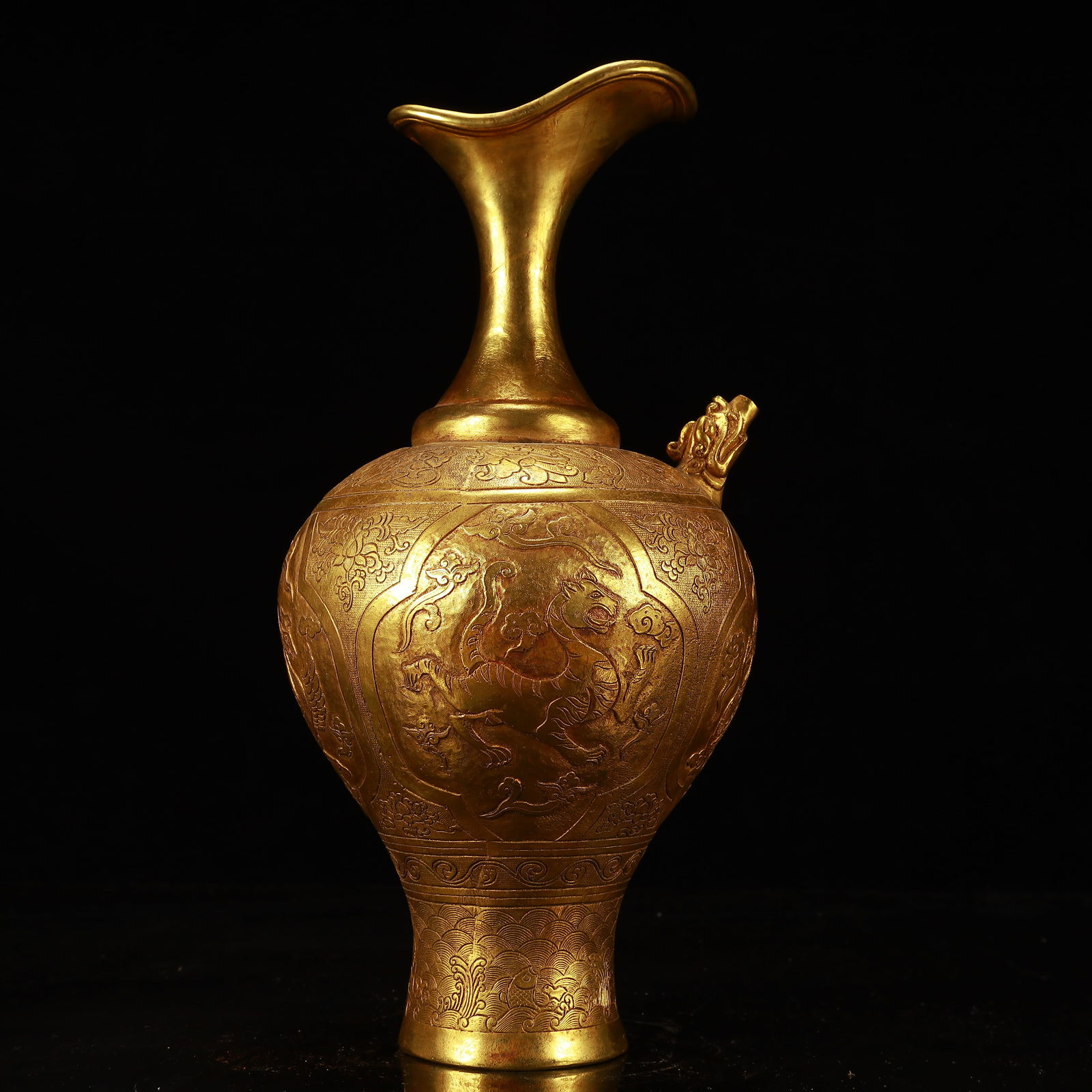An Exquisite Gilt Bronze Auspicious Beast Pattern Vase: An Exquisite Gilt Bronze Auspicious Beast Pattern Vase,Tang Dynasty, China,Zhenguan Four-character Mark,Size:6.3inx13.4in,Weight:1700g 铜鎏金瑞兽纹瓶,中