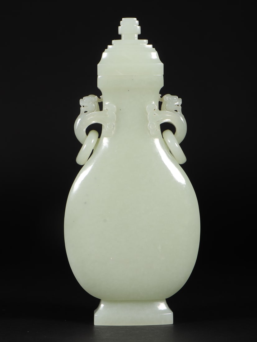 An Exquisite White Jade Double-Ears Bottle: An Exquisite White Jade Double-Ears Bottle,Qing Dynasty,China,Size:3.3inx1.5inx7.5in,Weight:354g 白玉双耳盖瓶,中国清代