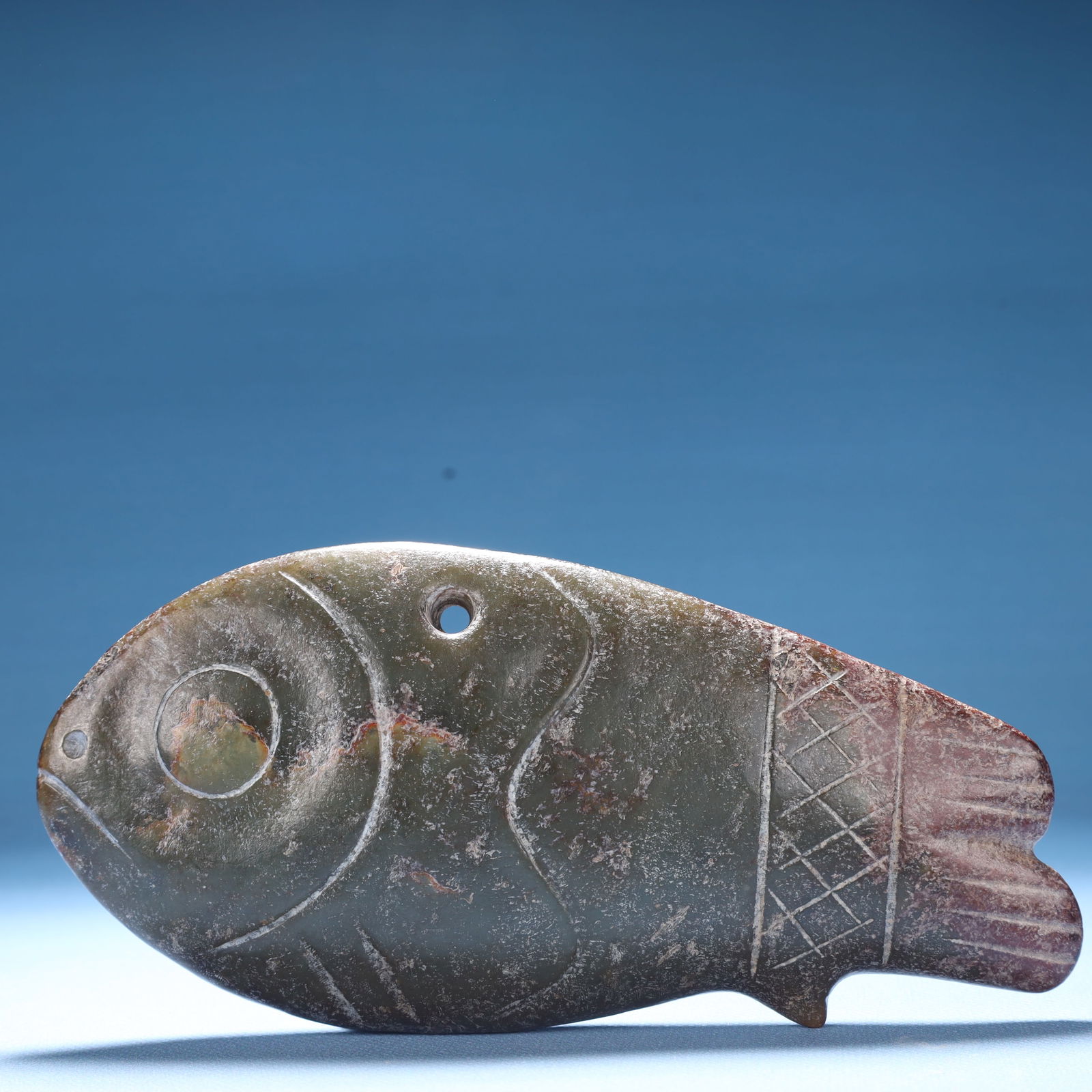 An Archaic Hongshan Culture Greenish Jade Fish Ornament: An Archaic Hongshan Culture Greenish Jade Fish Ornament,Ancient Time,China,Size:6.9inx3.1inx1in,Weight:479.5g 
