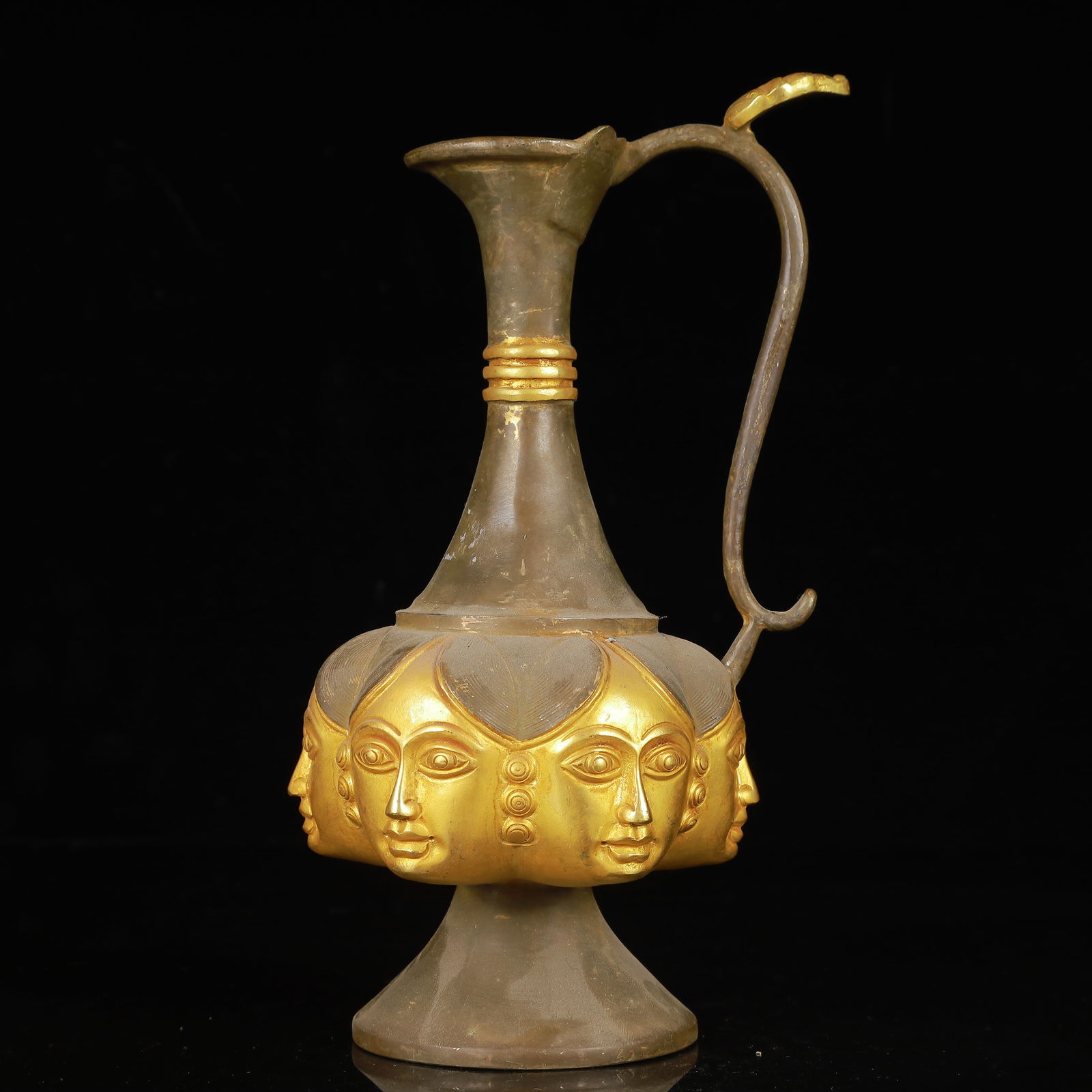 An Exquisite Gilt Silver Figure-Face Pattern Ewer: An Exquisite Gilt Silver Figure-Face Pattern Ewer,Qing Dynasty,China,Size:4.3inx8.7in,Weight:600g 银鎏金人面纹执壶,中国清代